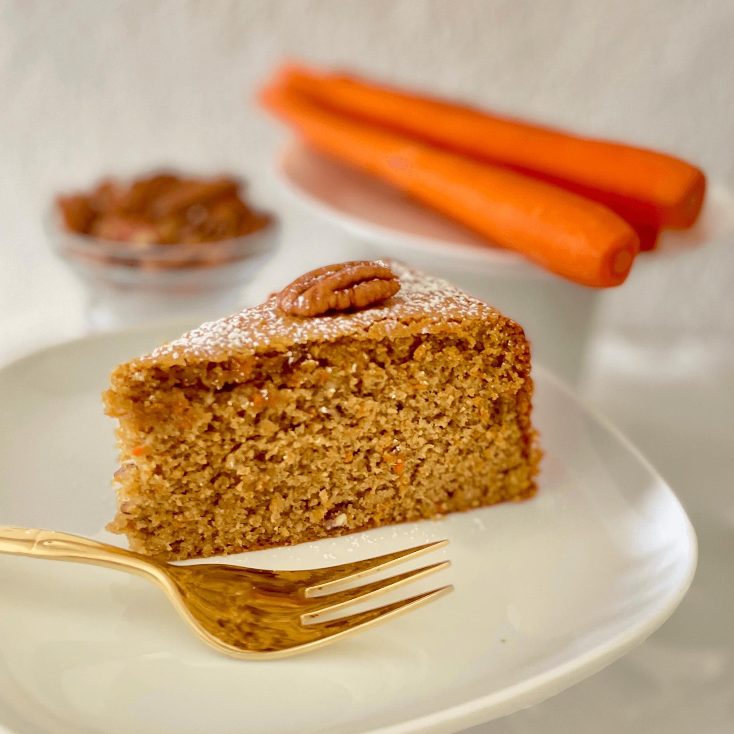 Healthy Carrot Pecan cake, dairy, gluten and sugar-free, topped with caramel and toasted pecans, a guilt-free indulgence. Full Life Gourmet Bakery