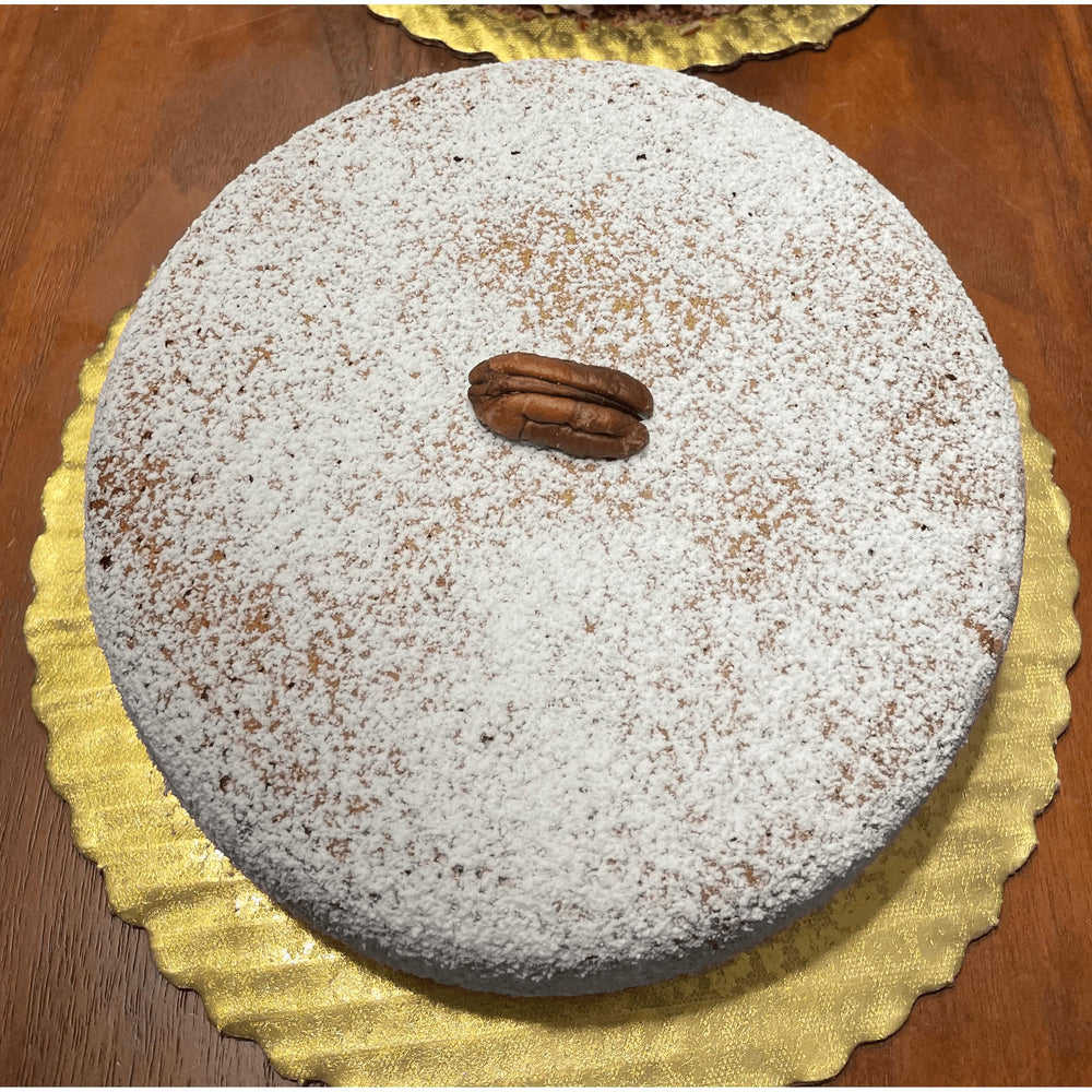 
                  
                    Gluten-free, sugar-free, dairy-free Carrot Pecan Full Life Cake topped with sugar-free caramel syrup and toasted chopped pecans, featuring sweet organic carrots and rich cinnamon for a moist, delicious slice.Full Life Gourmet Bakery
                  
                