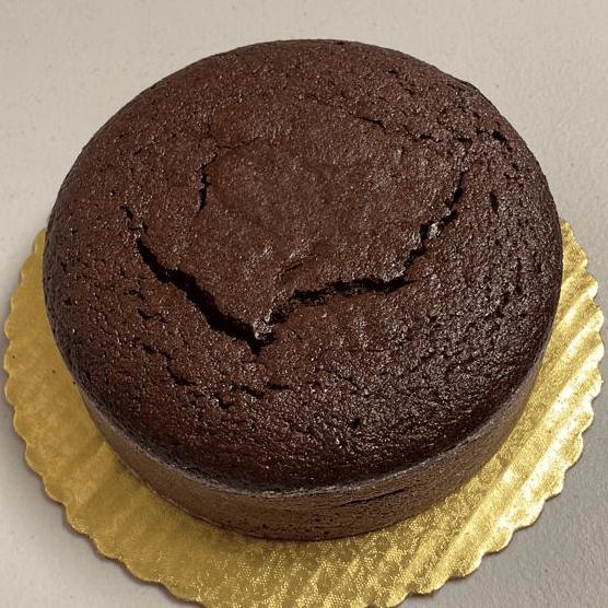 
                  
                    Gluten-free, sugar-free, dairy-free Chocolate Lovers Full Life cake with organic dark chocolate and sugar-free chocolate chips, topped with sugar-free chocolate syrup, offering a rich and moist texture. Full Life Gourmet Bakery
                  
                