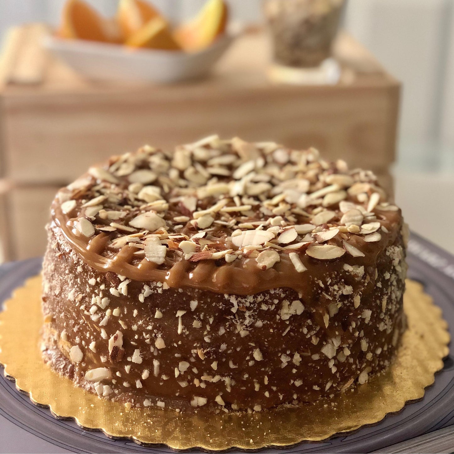 Gluten-Free, Dairy-Free and Sugar-Free Pumpkin Cinnamon cake with caramel topping, perfect for health-conscious dessert lovers. Full Life Gourmet Bakery