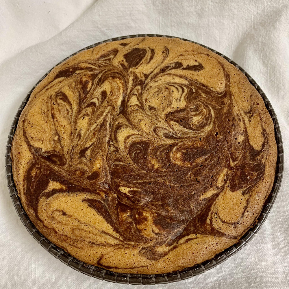 Marvelous-Marble cake combining vanilla and chocolate flavors, gluten and sugar-free for a healthy yet indulgent dessert. Full Life Gourmet Bakery