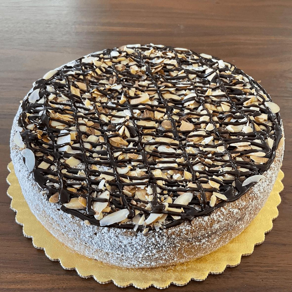 
                  
                    Gluten-free, dairy-free, sugar-free Vanilla and Chocolate, Marvelous Marble Full Life cake, featuring layers of moist vanilla and rich dark chocolate, topped with sugar-free chocolate syrup and extra chocolate chips for a luxurious finish. Full Life Gourmet Bakery
                  
                