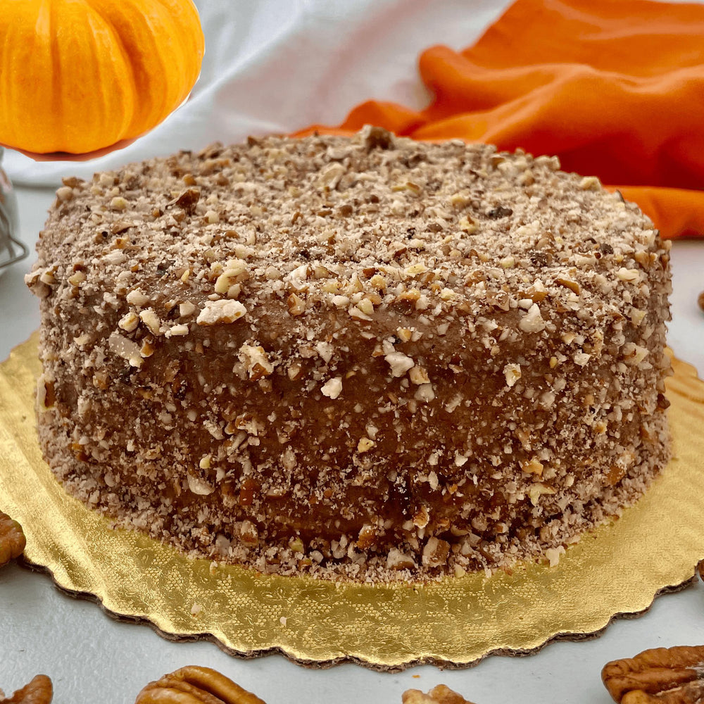 Gluten-free, dairy-free, sugar-free Pumpkin Cinnamon Delight Full Life Cake with a sugar-free caramel syrup topping and crunchy pecans, capturing the essence of Thanksgiving flavors. Full Life Gourmet Bakery