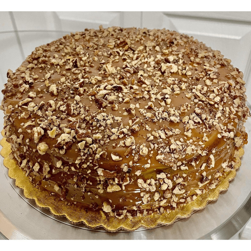 Gluten-Free, Dairy-Free and Sugar-Free Pumpkin Cinnamon cake with caramel topping, perfect for health-conscious dessert lovers. Full Life Gourmet Bakery