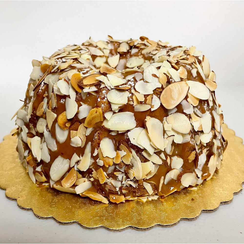 
                  
                    Gluten-free, dairy-free, sugar-free Vanilla Caramel Full Life Cake with a sugar-free caramel syrup drizzle and toasted almonds, showcasing its spongy texture and rich vanilla aroma. Full Life Gourmet Bakery
                  
                